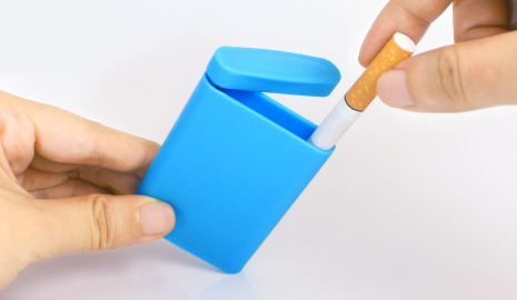 The inner bee-hive compartment automatically puts out your cigarette when you slot it inside.