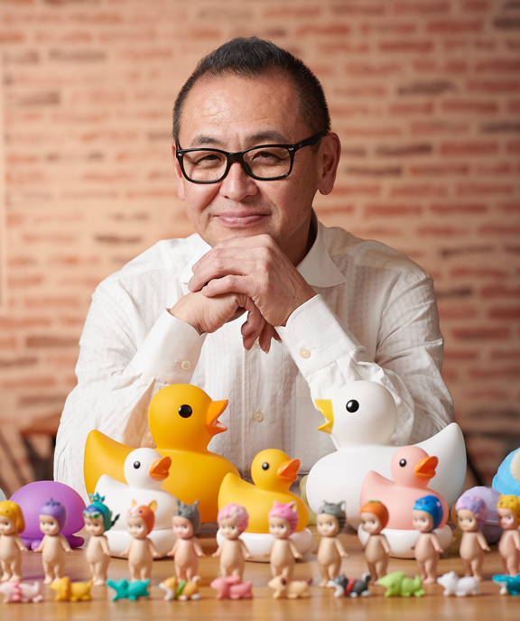 Toru Soeya, the toy manufacturer who created Sonny Angels, with many of his products